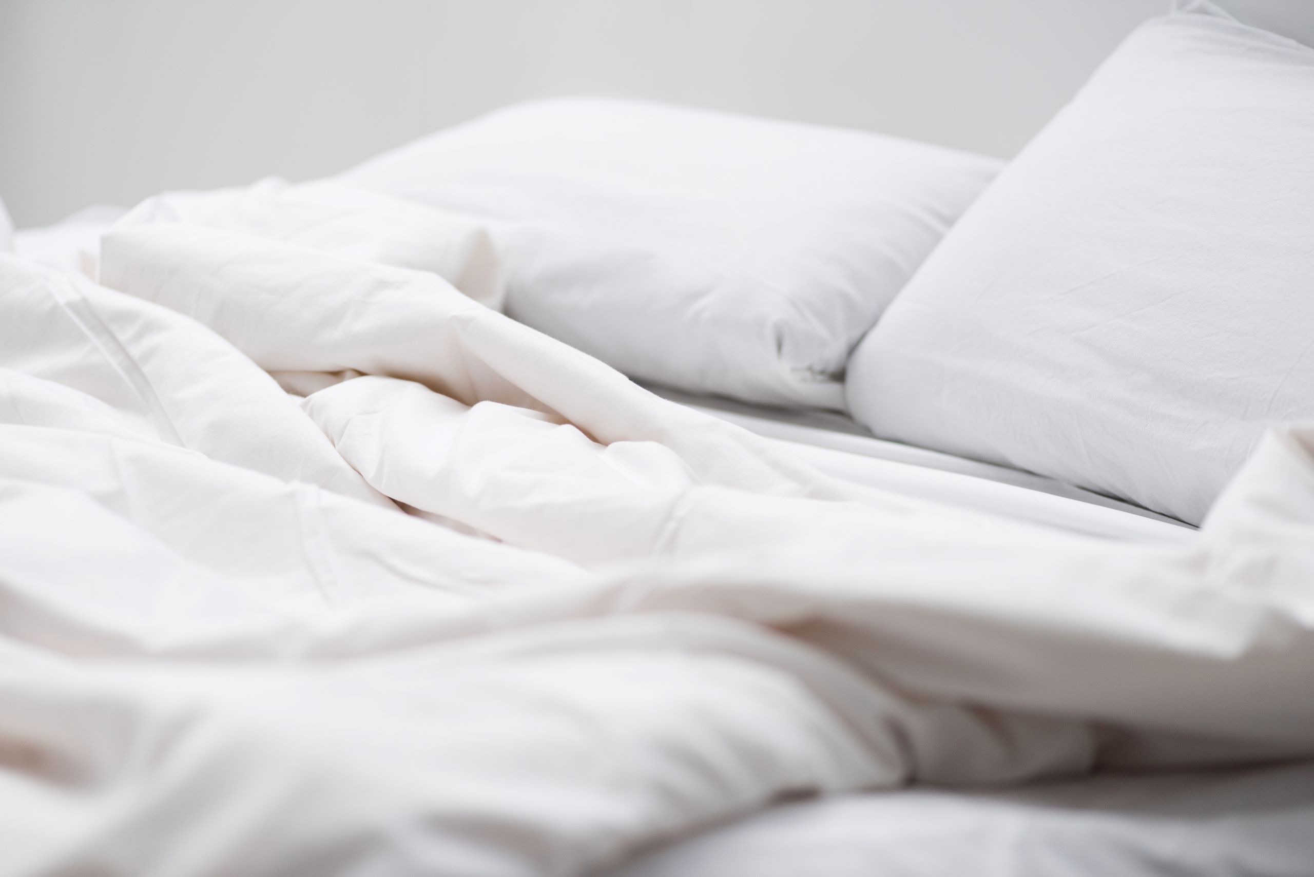 selective focus of bed with white pillows and blan 2024 11 17 05 37 52 utc